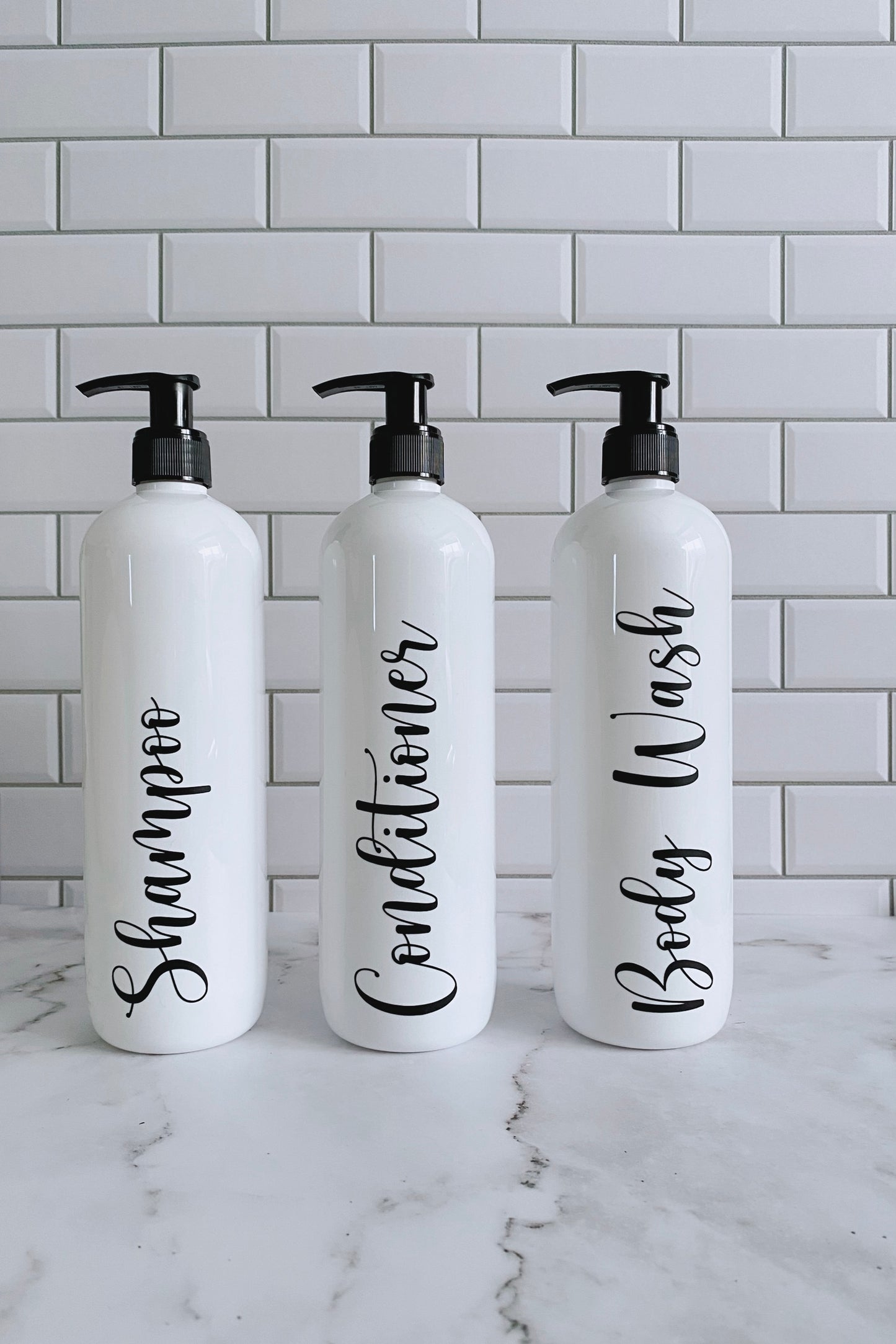 Set of 3 White Shampoo, Conditioner and Body Wash Pump Bottles